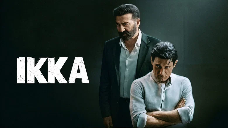 Ikka - Two Actors Holding Up A Script That Keeps Sliding